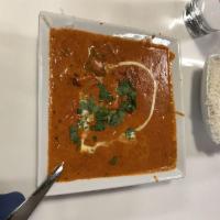 Chicken Tikka Masala · Chicken cooked with tomato, onion, bell pepper, and spices.