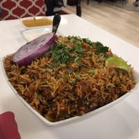 Vegetable Biryani · Mixed vegetables cooked in basmati rice with special herbs and spices.