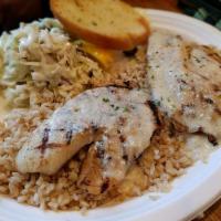 Tilapia · Served Cajun style or with garlic butter sauce. Includes toasted garlic bread and choice of ...
