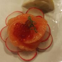 Sashimi · Filets of fresh raw fish with radish.
