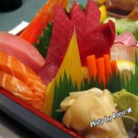 Chirashi · Assorted fresh fish and vegetables over a bed of sushi rice.