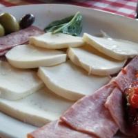 Antipasto · Fresh mozzarella, oven roasted sweet red peppers, Genoa salami, olives and fresh baked bread.