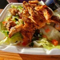 Grilled Chicken Salad · Grilled chicken, iceberg, tomato, cucumber, cheddar-jack, onion, croutons.