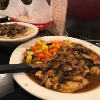 Chicken Marsala · Mushrooms and Marsala wine.