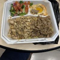 Chicken and Gyro Plate · Rice, hummus, salad, garlic, and tzatziki sauce.
