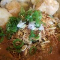 Curry Udon Noodles · Curry gravy, scallion, bean sprout, cilantro, fried tofu, fried eggplant, fried onion, and t...