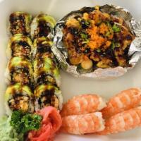 Baked Scallop Roll · Base California roll top baked scallop, mushroom, masago, onion, and dynamite sauce.