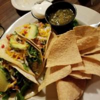 Walleye Tacos · Our famous walleye fillet cut into bite size pieces, seasoned, grilled, and layered in three...