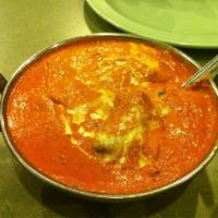 Chicken Tikka Masala · Boneless chicken prepared in Indian clay oven and cooked in mildly spiced gravy. Nut free, g...