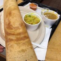 Masala Dosa · Rice and lentil crepe stuffed with potato masala and served with chutney and sambar. Low fat...