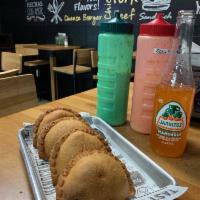 4 Empanada Combo · Served with canned soda.
