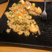 Shrimp Fried Rice · Shrimp Fried rice is stir fried with onion, zucchini, yellow squash, carrot, peas, and egg. ...