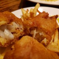 Homemade Fish and Chips · Cod fillet, deep fried London style served with french fries, homemade coleslaw and tartar s...