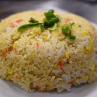Crab Fried Rice · Fried rice smothered with eggs and imitation crab meat.