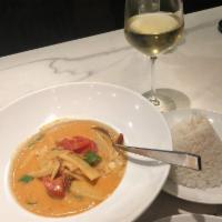Red Curry · Thai spices blended in chili paste with bamboo shoot, basil, string bean, and bell pepper si...
