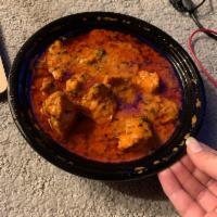 Chicken Tikka Masala Curry · Fire grilled boneless chicken cubes dunked into a lightly spiced rich cream gravy.