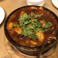 Hot and Spicy Fish Clay Pot · Fish Fillet cooked in spicy bean sauce.  Level 3 Spicy.  (Rice Not Included)