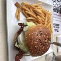 Avocado Burger · Classic American favorite. Juicy 1/3 lb. ground chuck burger served on a sesame seed bun, cr...