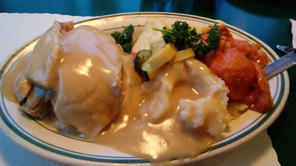 Homemade Turkey Dinner · Served the old-fashioned way with stuffing, homemade gravy, lumpy mashed potatoes, fresh vegetables, a roll and butter.