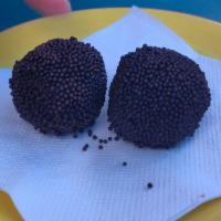 Brigadeiro · Truffle-like chocolate puffs made with condensed milk and cocoa.