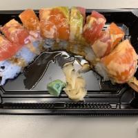 Tiffany Roll · Inside stuffed served with shrimp tempura, crab, and avocado. Outside tuna, salmon, and avoc...