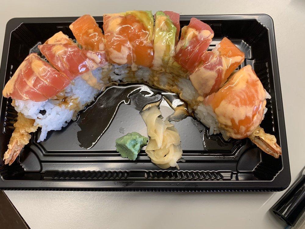 Tiffany Roll · Inside stuffed served with shrimp tempura, crab, and avocado. Outside tuna, salmon, and avocado.