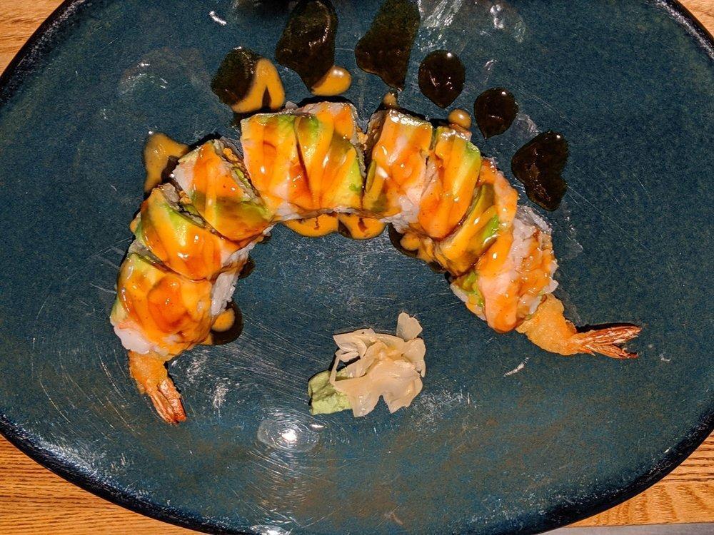 Amber Roll · Inside stuffed with shrimp tempura, avocado, and spicy crab. Outside avocado and shrimp.