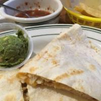 Grilled Chicken Quesadilla · A flour tortilla with melted cheese. Served with rice and beans.
