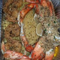 Whole Dungeness Crab, Prawns and Garlic Noodles · 