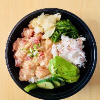 Creamy Pop Poke Bowls · Spicy Mayo and masago tuna, salmon, crabmeat, seaweed salad and vegetables over spring mix, ...