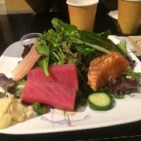 Sashimi Salad · 2 tuna, 2 salmon, 2 albacore, spring mix and house dressing.