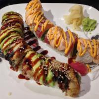 Sunrise Roll · Spicy mayo, seared tuna and salmon on top of tempura shrimp, imitation crabmeat and cucumber.