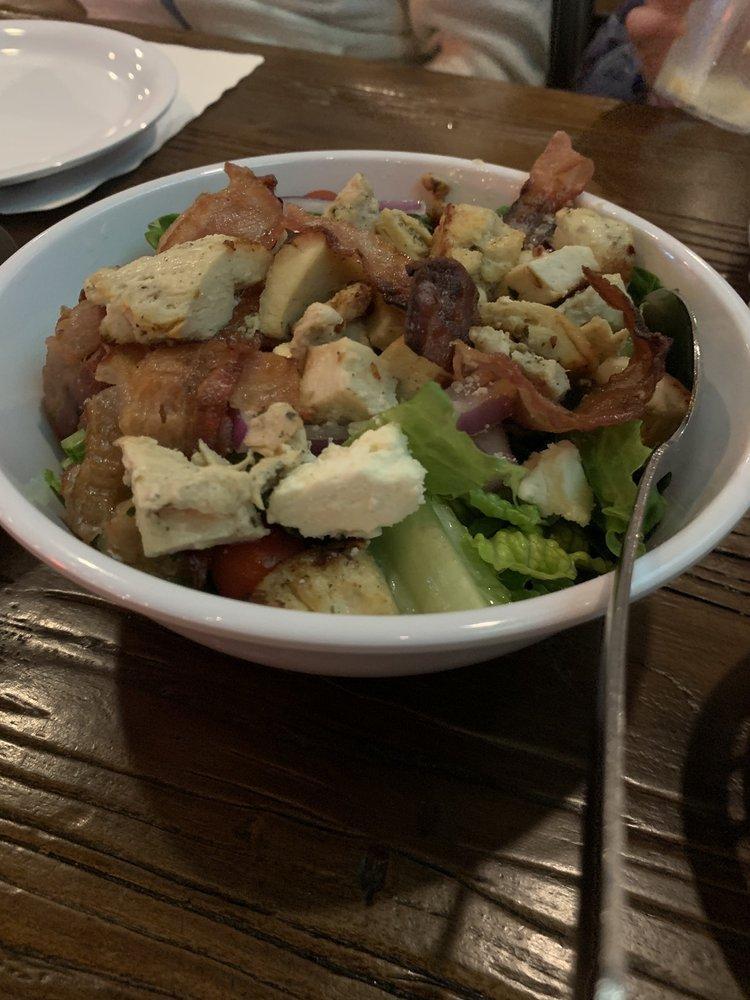 Chopped Chicken Salad · Marinated and roasted chicken breast, rough cut crispy bacon, red onion, crumbled feta cheese, tomato and crispy lettuce.