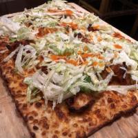 Buffalo Chicken Pizza · Chicken tenders tossed in Buffalo wing sauce, shredded lettuce, diced celery and drizzled wi...