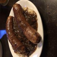 Bangers and Mash · Irish style banger sausages, buttery colcannon and our savory Guinness gravy.