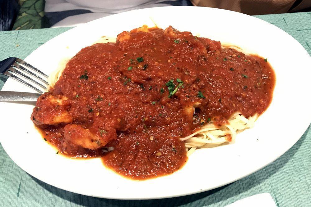 Shrimp Fra Diavolo · Shrimp sauteed in spicy marinara and white wine sauce served over pasta.