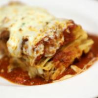 Lasagna · Stacked high with tender pasta, seasoned beef, Italian cheese blend, fresh herbs and Bologne...