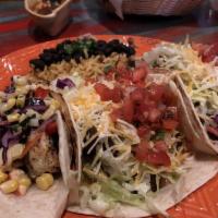 Ground Beef Tacos · Lettuce, pico de gallo, Mexican cheese, and Mexican crema.