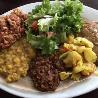 Veggie Combo · Choice of 5 vegetarian dishes and plus a house salad. Vegetarian. No salad include when it i...