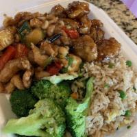 Kung Pao Chicken · A Sichuan-inspired dish with chicken, peanuts and vegetables, finished with chili peppers. S...