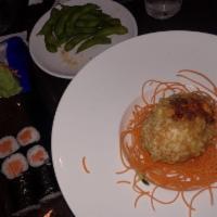 Dragon Egg · Deep fried half shell avocado filled with spicy scallop, smoked salmon, spicy snow crab & cr...