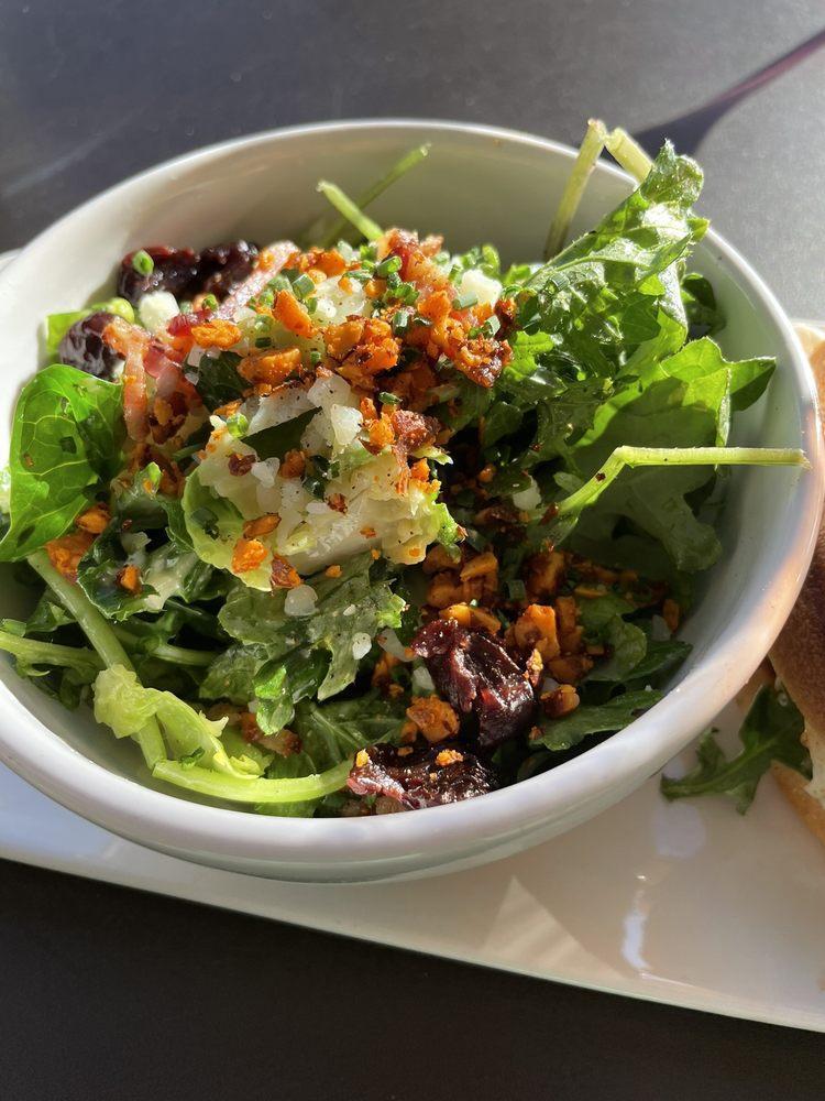 Brussels Sprouts Salad · Kale, romaine, Brussels sprouts, manchego, spicy marcona almonds, bacon, dried cherries with lemon manchego dressing. *All dressings will be served on the side.