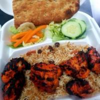Chicken Tikka Kabob · Boneless chicken cubes marinated in spices and yogurt then grilled on a charcoal grill.
