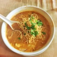 Yellow Curry · Indian influenced curry with Carrots, onion & potato in Ga-ree spiced chili paste w/choice o...