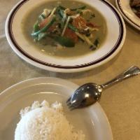 Green Curry · Bamboo, bell peppers, green bean, kaffir leaf & basil in green chili paste with choice of meat