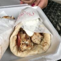 Chicken Pita · Charbroiled chicken breast marinated Greek style served with salad and side
