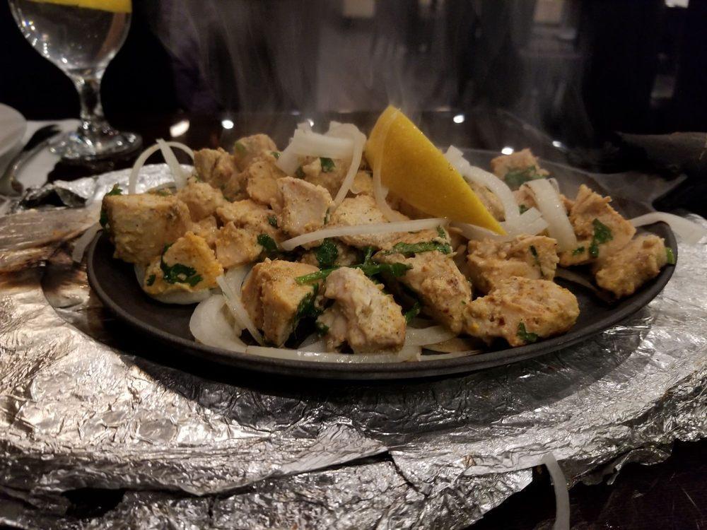 Chicken Malai Kabab · Mouth watering, succulent pieces of chicken, marinated with Indian spices and almond paste cooked to perfection in tandoor oven.