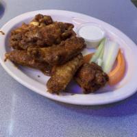 10 Wings · Grade A wings tossed in one of our homemade sauces. Your choice of celery or carrots include...