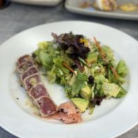 Tuna Salad · Seared ahi tuna served rare, mixed greens, mango, avocado, black sesame seeds, cilantro-lime...