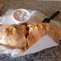 Stromboli · Stuffed with mozzarella cheese, pizza sauce and up to 3 toppings.